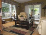 MLS # 323952: LIVING ROOM WITH ACCESS TO SUNROOM