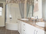 MLS # 323952: ENSUITE BOASTS DOUBLE SINKS & SOAKER TUB WITH SHOWER
