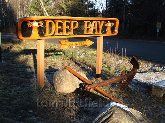Photo of Deep Bay welcome sign