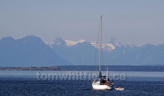 Photo of Sailboat Heading Out To Points Beyond
