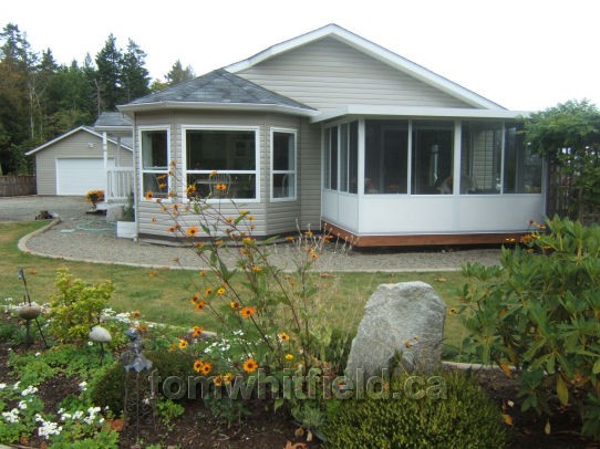 Photo of single family home on Wildwood Road in Qualicum Beach, BC