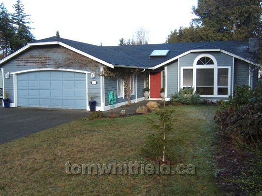 Photo of single family home on Namqua Road in Qualicum Beach, BC